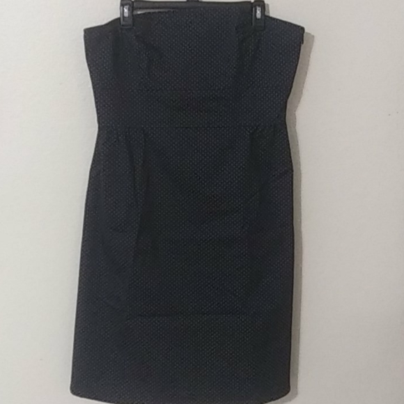 Strapless Dress is lined inside. It is a blue/dk green color w/ gold polkadots - Picture 2 of 4